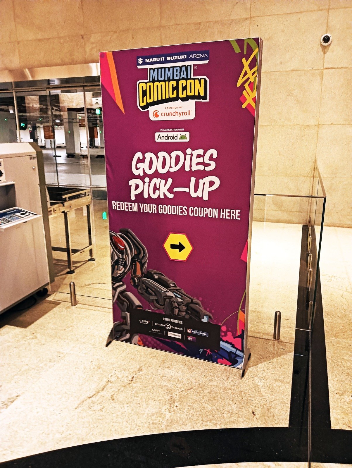 Wayfinding & Directional Branding — Directional standees guiding footfall through a large event venue.