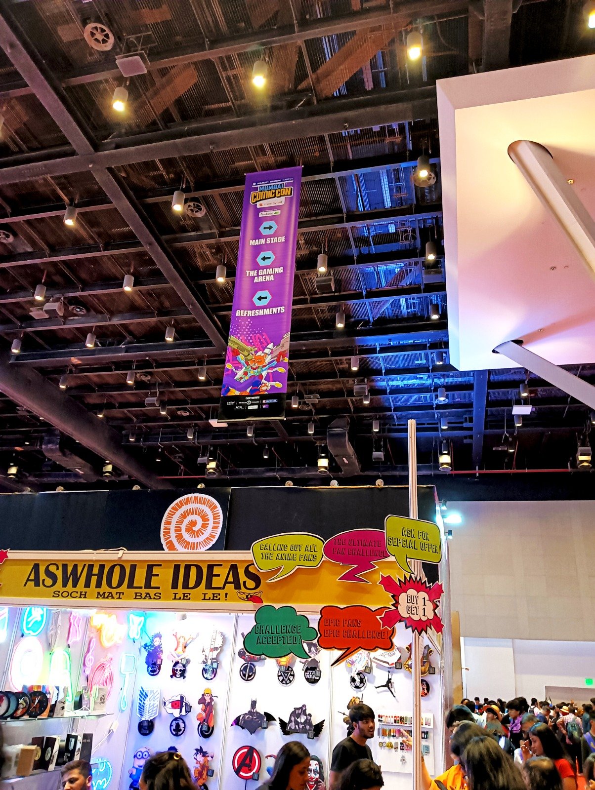 Suspended Directional Banner — Overhead directional hanger guiding visitors through a busy hall.